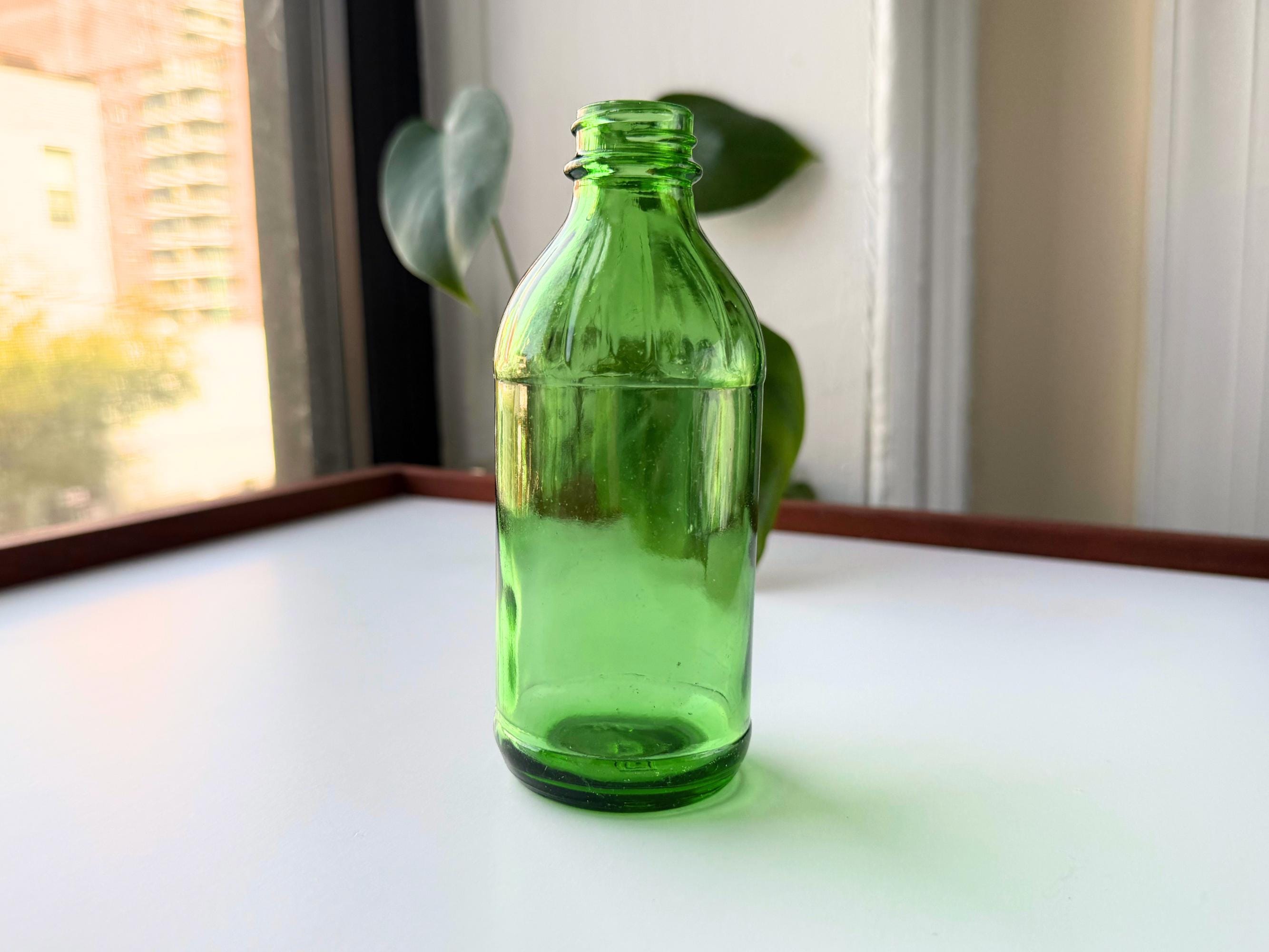 Vieille bouteille verre d'occasion - Collection