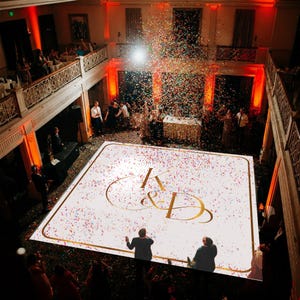 Customizable vinyl Dance floor Wrap for wedding receptions. Includes monogram and wedding logo. Removable. No Residue or Damage. Ships Free.