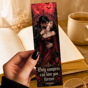 May include: A rectangular bookmark featuring a gothic illustration of a vampire couple in dark red and black attire. The scene includes a full red moon, bats, and roses. The text reads: Only vampires can love you forever, Luna and LDM.