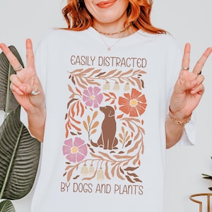 Easily Distracted by Dogs and Plants Shirt: Unisex Cotton Tee