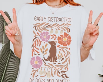 Easily Distracted by Dogs and Plants Shirt: Unisex Cotton Tee
