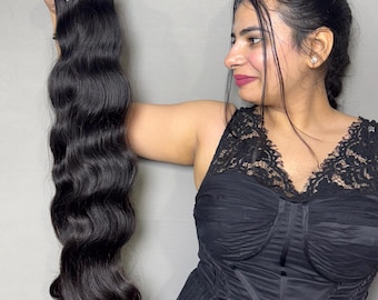 Pacchetti di capelli ondulati vergini indiani: neri naturali, morbidi e setosi