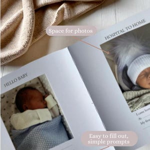 May include: A white baby memory book with a blue and white blanket and a baby in a white onesie. The book has the words "Hello Baby" and "Hospital to Home" on the cover. The book has space for photos and easy to fill out, simple prompts.