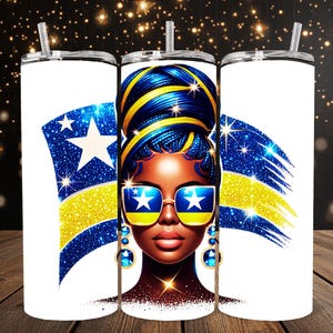 May include: A white tumbler with a blue and yellow glitter design featuring a woman with a blue and yellow braided bun, wearing sunglasses and earrings. The design resembles the flag of the Bahamas.