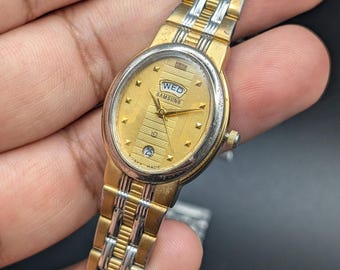 Vintage Samsung Two-Tone Gold & Silver Watch, Day-Date Feature, Mid-century Style, Elegant Dress Watch