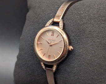 Caravelle New York Rose Gold Crystal Bezel Bangle Watch