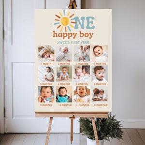 K&ouml;nnte beinhalten: Ein beiger Poster mit einer Sonnengrafik und dem Text "One happy boy" und "Jayce's First Year". Das Poster zeigt 12 Fotos eines kleinen Jungen von 1 bis 12 Monaten.