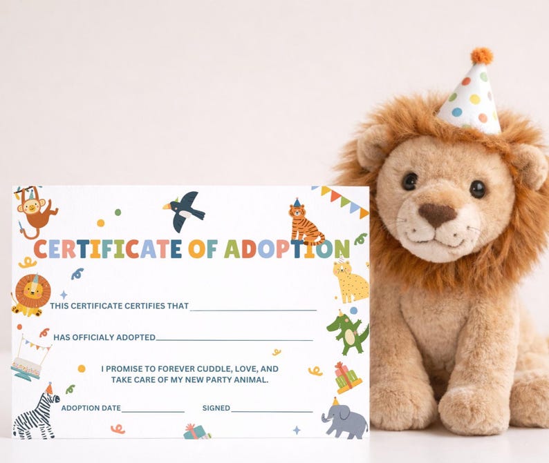 May include: A colorful "Certificate of Adoption" with animal illustrations and text. A plush lion wearing a party hat sits next to the certificate. The certificate includes fill-in-the-blank lines for the adopted animal's name and adoption details.