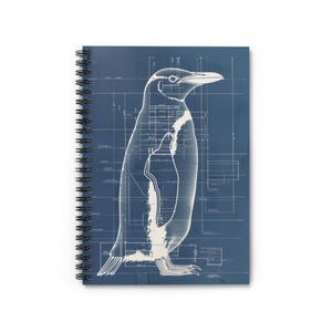 May include: A blue and white blueprint style illustration of a penguin. The penguin is outlined in white and the background is a dark blue.