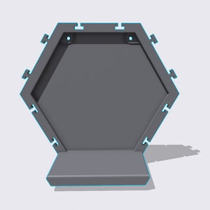 May include: A gray hexagonal shelf with a small ledge on the bottom. The shelf has two holes on the top for hanging.