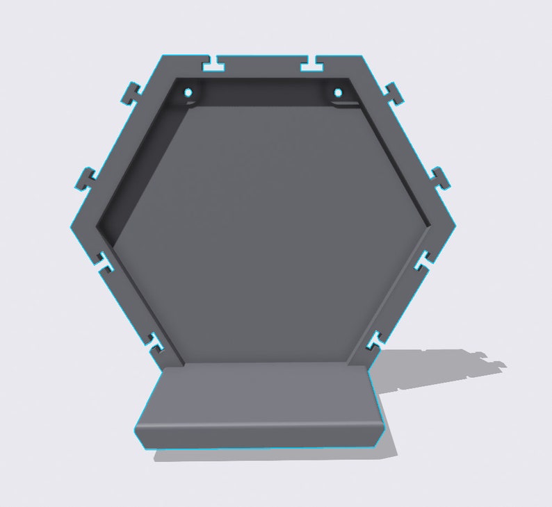 May include: A gray hexagonal shelf with a small ledge on the bottom. The shelf has two holes on the top for hanging.