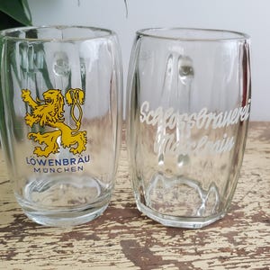Vintage Set Of 2 Beer Mug Germany Lowenbrau Munchen Schlossbranerei