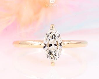 Anillo de compromiso de diamantes marquesa en oro macizo de 14 k