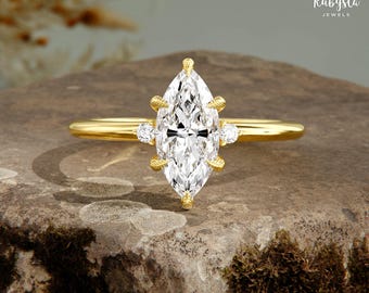 Anillo de compromiso con diamantes de laboratorio de talla marquesa: halo de garras en oro de 14 k