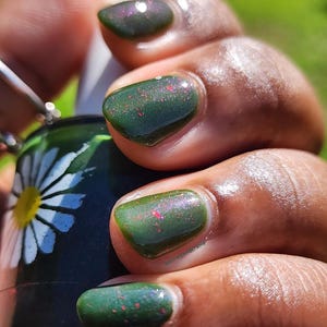 Collina, 15ml 21-free Indie Nail Polish, Dark Murky Green Polish with Large Red Metallic Flakes and Blue to Purple Shimmer