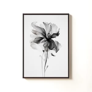 May include: Black and white floral art print in a black frame. The image features a detailed, close-up view of a flower with delicate petals and a dark center. The artwork is set against a white background, creating a high-contrast, elegant aesthetic.