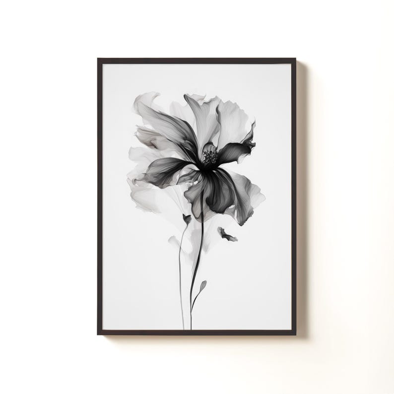 May include: Black and white floral art print in a black frame. The image features a detailed, close-up view of a flower with delicate petals and a dark center. The artwork is set against a white background, creating a high-contrast, elegant aesthetic.