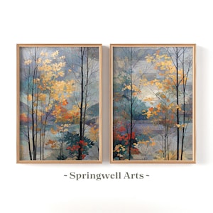 May include: Two framed landscape paintings depicting a forest scene with trees in autumnal hues of yellow, orange, and red. The background has a blue and grey colour palette. The text "Springwell Arts" is at the bottom.