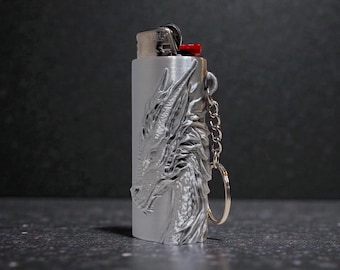Llavero con funda para encendedor con cabeza de dragón
