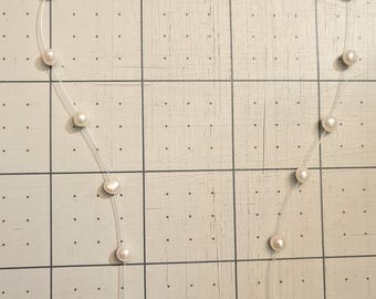 gargantilla de perlas de ilusión