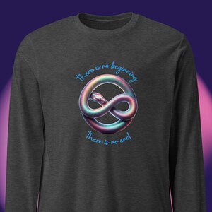 May include: Dark gray long-sleeve shirt featuring a colorful snake in an infinity symbol. The text "there is no beginning, there is no end" is arched above and below the snake design in a light blue color.