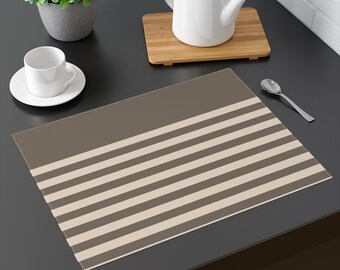 Dark gray placemats with beige stripes. Simple and elegant design. Table accessories for boho style home.