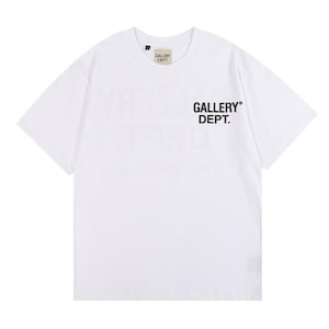 a white t - shirt with the words gallery dept printed on it