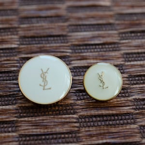 Vintage YSL White/Cream Buttons. 2 sizes