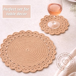 May include: Two beige crochet placemats with scalloped edges and a central spiral design. One placemat has a wine glass on top. The text "Perfect set for table decor" is in the upper left corner. A circular "Handmade with Love" logo is in the lower right.