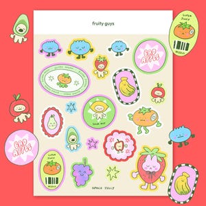 Puede incluir: Una hoja de pegatinas coloridas con frutas antropomórficas y el texto "fruity guys". Las pegatinas incluyen una fresa, un limón, un aguacate y un tomate. Algunas pegatinas tienen el texto "BAD APPLE", "SUPER JUICY" y "SPACE JELLY".