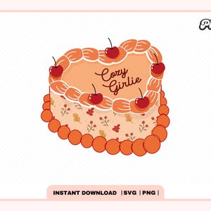 May include: A heart-shaped cake decorated with orange icing and a pattern of leaves and berries. The cake is topped with red cherries and has the words "Cozy Girlie" written in brown cursive.