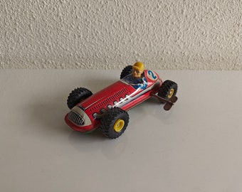 Voiture de course vintage en tôle avec pilote - Allemagne de l'Ouest - En état de fonctionnement - 16 cm / 6"