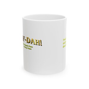 May include: White ceramic mug with a gold design that says "OF-DAH! The Organic Farm Strategy Game" on the front. The text "Yeah, really about" is on the right side of the mug.