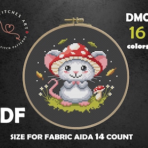 May include: Cross stitch pattern featuring a cute cartoon mouse wearing a red and white mushroom cap. The pattern is designed for Aida 14 count fabric and measures 5.07 x 4.71 inches or 71 x 66 stitches. The pattern requires 16 DMC colors.