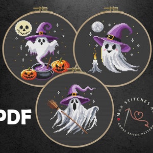 May include: Three cross stitch patterns featuring cute ghosts wearing witch hats. The patterns are in black and white with purple accents. The patterns are in embroidery hoops.