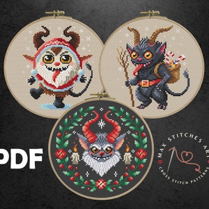 May include: Three cross stitch patterns featuring cute, cartoonish, Christmas-themed devils. The patterns are in embroidery hoops and include a red devil with a candy cane, a black devil with a sack of candy canes, and a gray devil with a red star on its head.