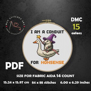 May include: Cross-stitch pattern in a wooden hoop. The design features an opossum in a purple wizard hat riding a goose, with the text "I AM A CONDUIT FOR NONSENSE." Includes size information: 6.00 x 6.29 inches.
