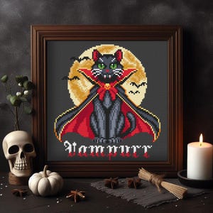 May include: A black cat dressed as a vampire with a red cape and fangs, standing in front of a full moon. The text "Vampurr" is written below the cat.