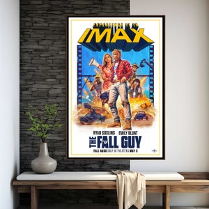 May include: Movie poster for the film "The Fall Guy" starring Ryan Gosling and Emily Blunt. The poster features a colourful image of the actors in a scene from the film. The text "EXPERIENCE IT IN IMAX" is at the top of the poster. The text "FALL HARD ONLY IN THEATERS MAY 3" is at the bottom of the poster.