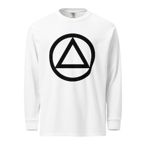 May include: White long-sleeve shirt featuring a black triangle within a circle graphic on the front. The design is centered on the chest. The shirt has a crew neck and long sleeves.