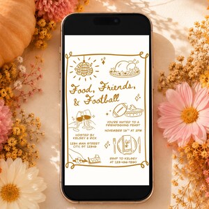 May include: A smartphone displaying a digital invitation with gold line art on a white background. The text reads Food, Friends, & Football, with illustrations of a disco ball, turkey, wine glasses, football, pie, and place setting details.