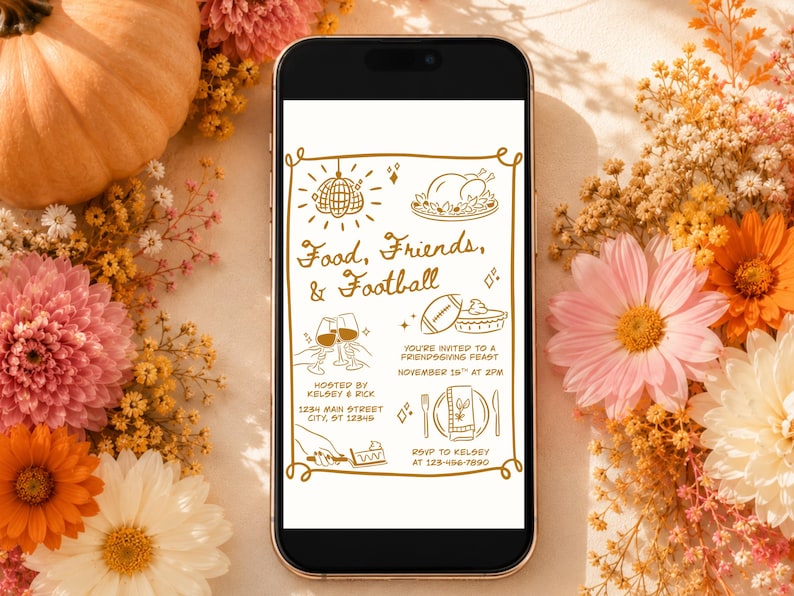 May include: A smartphone displaying a digital invitation with gold line art on a white background. The text reads Food, Friends, & Football, with illustrations of a disco ball, turkey, wine glasses, football, pie, and place setting details.