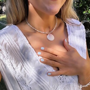 Shell necklace on pastel beaded chain
