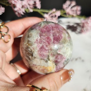 Beautiful pink tourmaline sphere with sparkly lepidolite. Smoky and clear quartz, natural, D