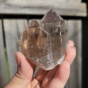 Beautiful natural smoky quartz cluster from Brazil with rainbows