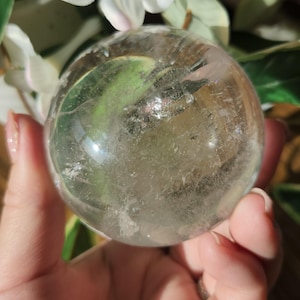 Amazing lemurian clear quartz sphere with rainbows and inclusions, from the Tocantins mine in Brazil, authentic lemurian 125L. 64-65mm