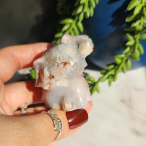 Cute happy hand carved flower agate elephant with quartz, natural