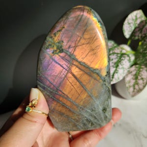 Beautiful purple pink,  orange, sunset white labradorite free form from Madagascar, natural labradorite