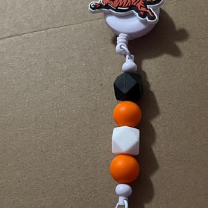 Nfl beaded badge reels