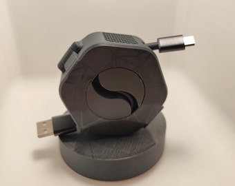 Convenient solution for organizing cables - portable cable holder and winder